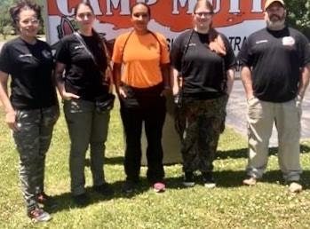 Group photo at Camp Mutt outdoor event