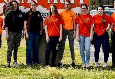 Camp Mutt group photo with trainer team