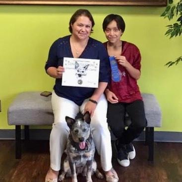 Heeler graduate with family