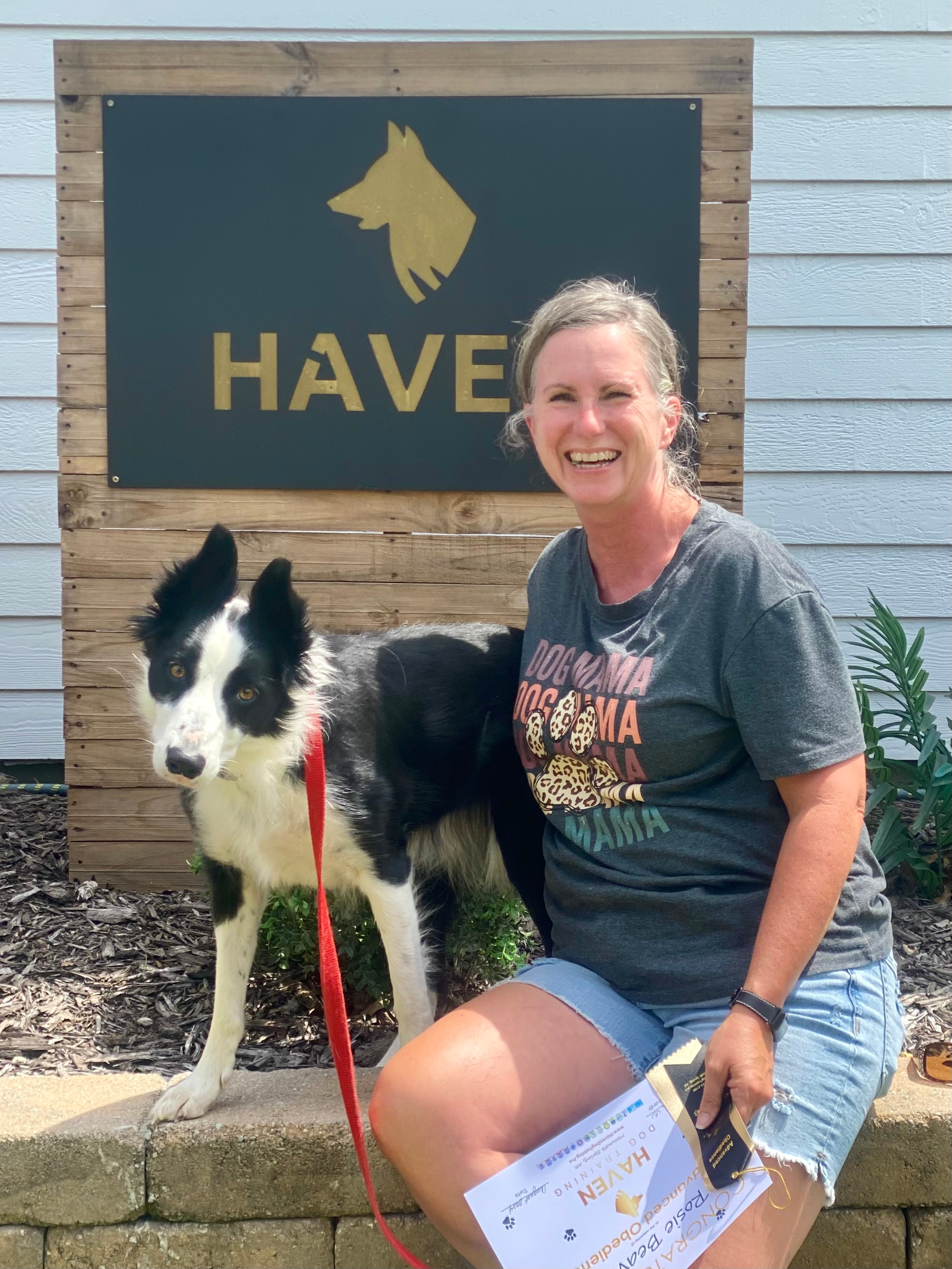 Rosie Beavers — Advanced Obedience graduate with owner and Border Collie at Haven sign