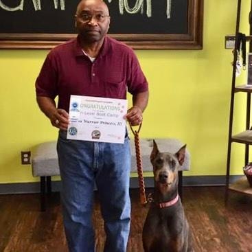 Warrior Princess III — Level Boot Camp graduate with owner holding certificate