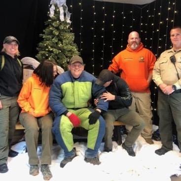 Haven team group photo in bite suits at Christmas event