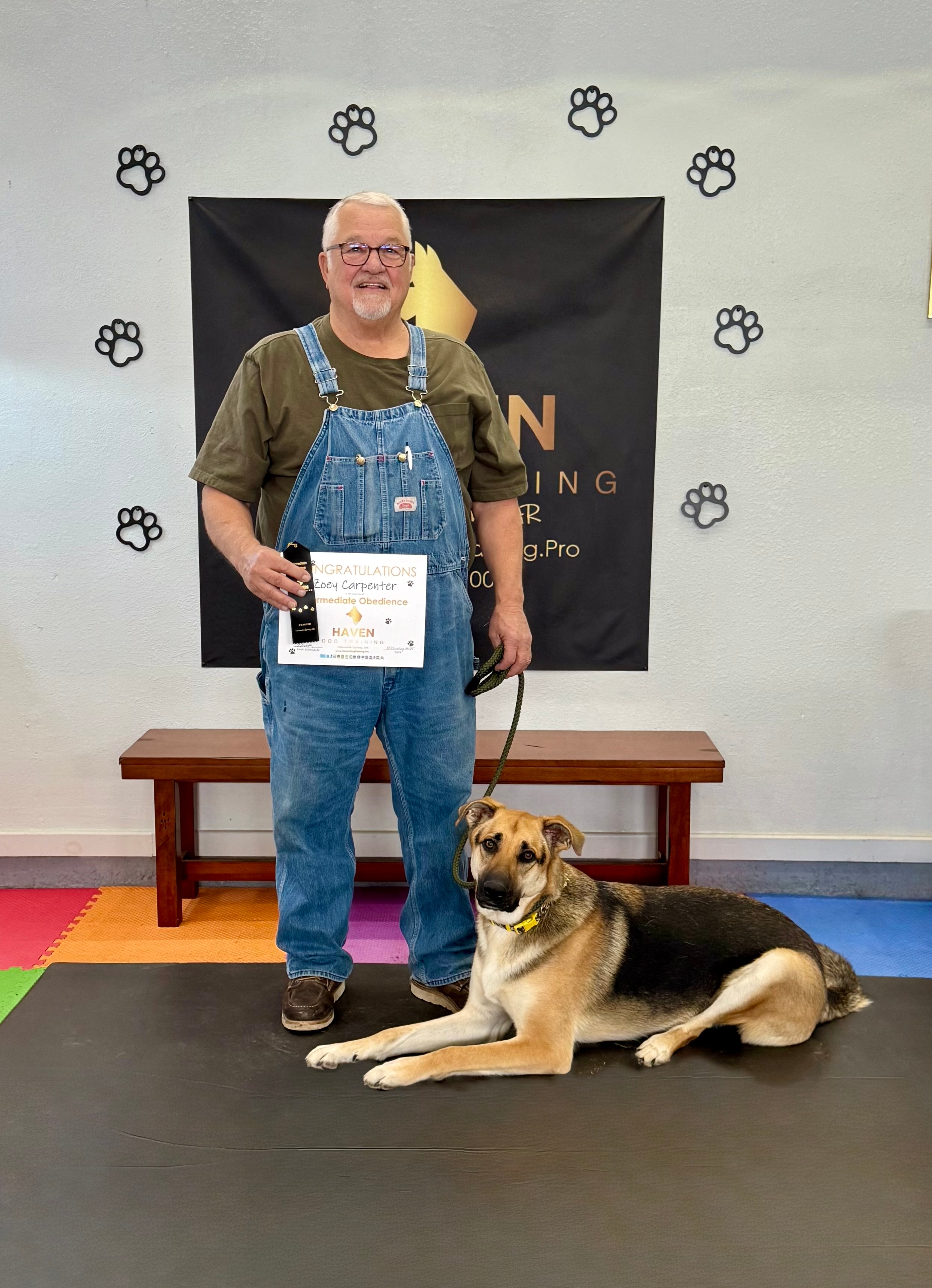 Zoey Carpenter — Intermediate Obedience graduate with owner at Haven banner